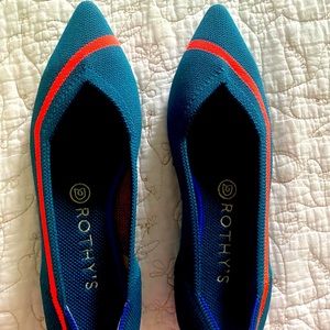 Beautiful turquoise and orange Rothy’s worn in my house once.  Size 8.5.